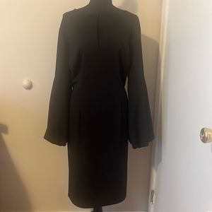 Ashley Stewart black dress size 14/16. Long puff sleeves, side split on rt side